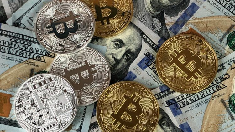 A wallpaper featuring a pile of bitcoins and dollars for Financial abundance. 